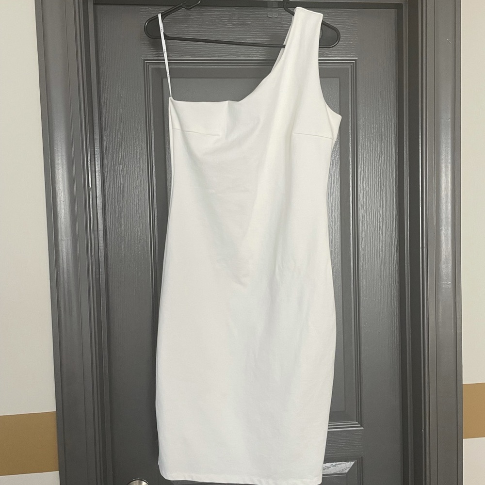 Lulu’s white one shoulder body-con dress.